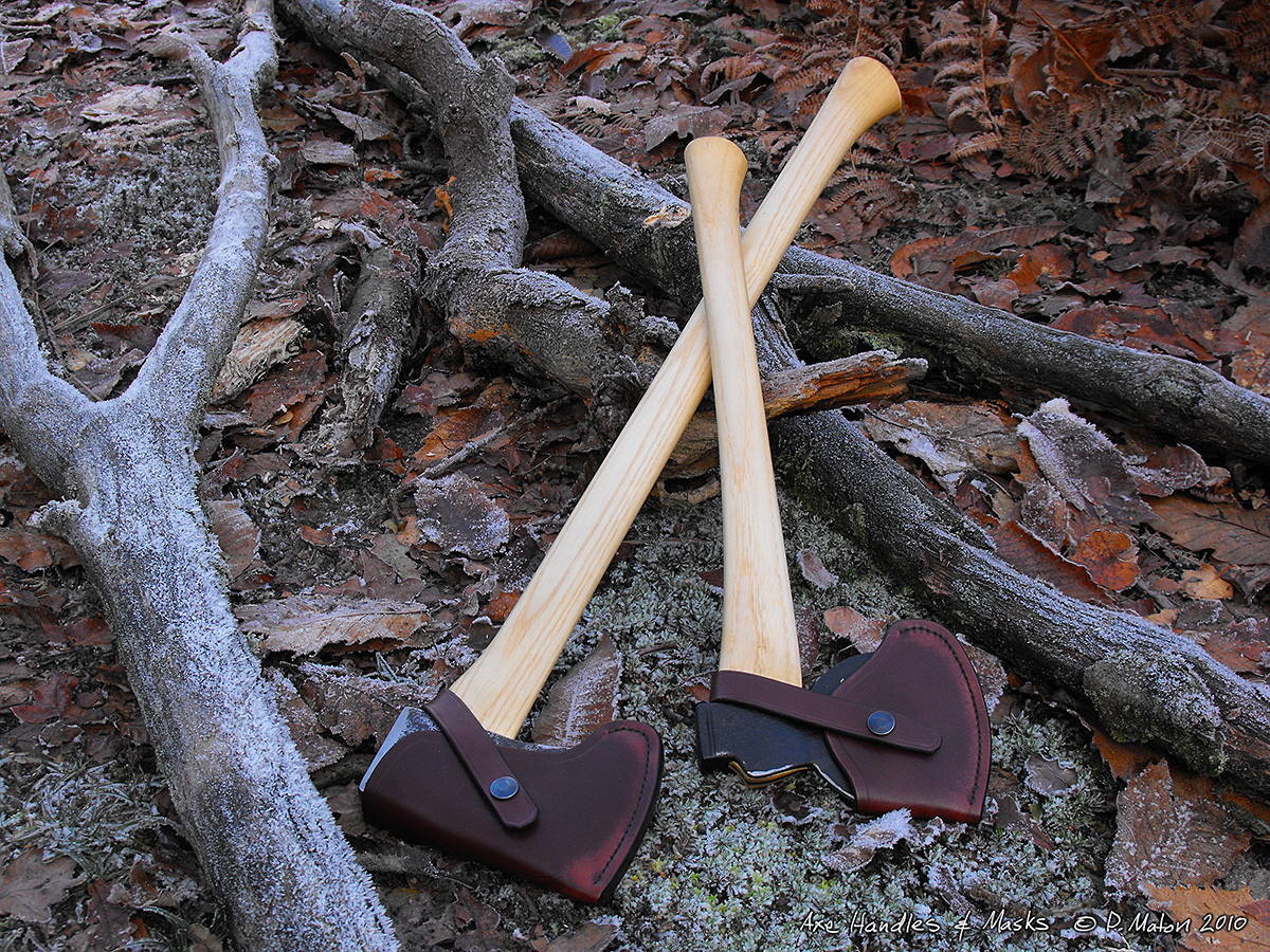 Axe Handles & Masks shown in frosty woodland setting whittleandstitch.net